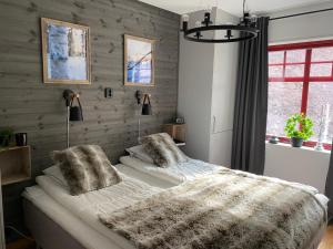 Postel nebo postele na pokoji v ubytování Sälenfjällen lägenhet