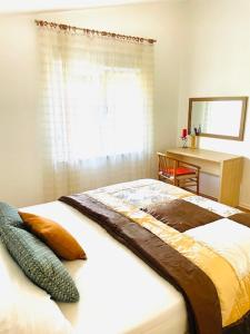 A bed or beds in a room at Apartments Bora