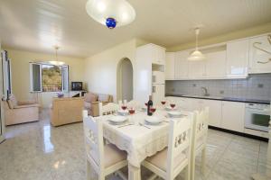 A kitchen or kitchenette at The Sunset Villa Kefalonia