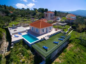 The swimming pool at or close to The Sunset Villa Kefalonia