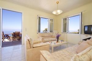 A television and/or entertainment centre at The Sunset Villa Kefalonia