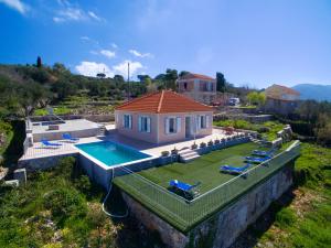The swimming pool at or close to The Sunset Villa Kefalonia