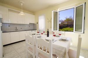 A kitchen or kitchenette at The Sunset Villa Kefalonia