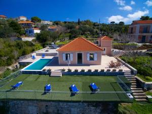 The swimming pool at or close to The Sunset Villa Kefalonia