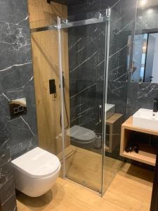 Łazienka w obiekcie Na Wczasowej - Apartamenty