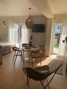 Telewizja i/lub zestaw kina domowego w obiekcie Na Wczasowej - Apartamenty