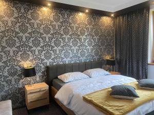Posteľ alebo postele v izbe v ubytovaní Apartamenty Pod Jesionem