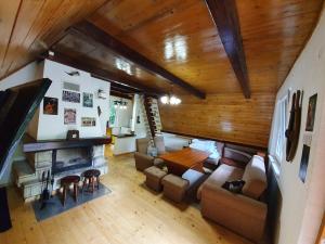 an overhead view of a living room with a fireplace at Leśny Zakątek in Dębica