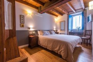 Posteľ alebo postele v izbe v ubytovaní Casa Perfeuto Maria