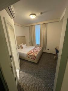 Letto o letti in una camera di Old Town Hotel