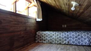 Postel nebo postele na pokoji v ubytování Tiny House II - Sítio dos Wolff + 21 fotografií