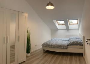 Katil atau katil-katil dalam bilik di Ostseenahe Erholung Ruhe Komfort in guter Lage