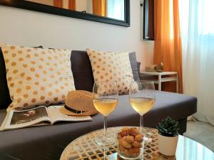 A seating area at Sherryflat Estudio- Parking,