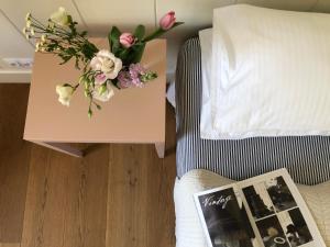 Posteľ alebo postele v izbe v ubytovaní Galerie Suites