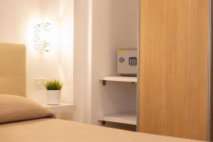 Postel nebo postele na pokoji v ubytování B&B Di Risio