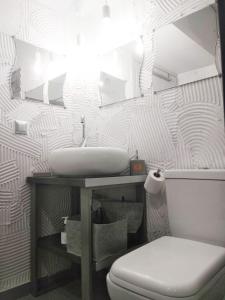 a bathroom with a sink and a toilet at Corfu Mariú Suite by Liston in Corfu +29 photos