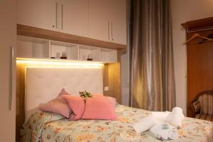 Postel nebo postele na pokoji v ubytování Hotel Antico Capon