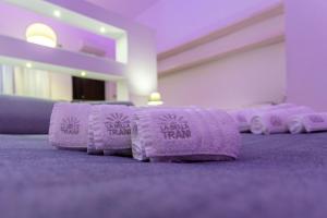 Postel nebo postele na pokoji v ubytování La Bella Trani - Suites and B&B