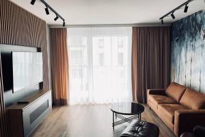 Posezení v ubytování Apartament Manufaktura z bezpłatnym parkingiem