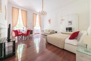 Televízia a/alebo spoločenská miestnosť v ubytovaní Music Academy Suite Café Vian Apartman Kft