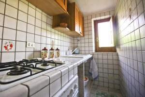 Cucina o angolo cottura di LEO APPARTAMENTI con vista panoramica