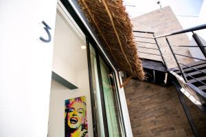 Balkón nebo terasa v ubytování Maui Hostels Playa del Carmen