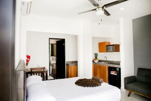 Postel nebo postele na pokoji v ubytování Maui Hostels Playa del Carmen