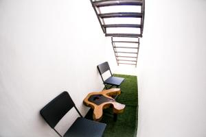 Posezení v ubytování Maui Hostels Playa del Carmen