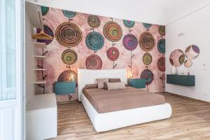 Posteľ alebo postele v izbe v ubytovaní FLOWER SUITE B&B