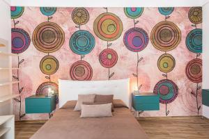 Posteľ alebo postele v izbe v ubytovaní FLOWER SUITE B&B