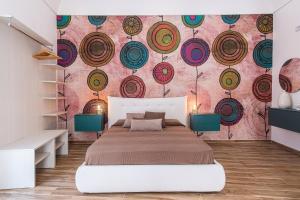 Posteľ alebo postele v izbe v ubytovaní FLOWER SUITE B&B