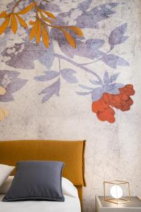 Posteľ alebo postele v izbe v ubytovaní FLOWER SUITE B&B