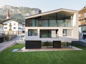 a house with a view of the mountains at Villa Margareth in Selva di Val Gardena