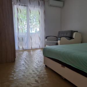 מיטה או מיטות בחדר ב-Apartment Danijela