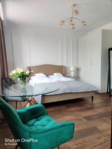 Posteľ alebo postele v izbe v ubytovaní Apartament Bazyliańska Stare Miasto