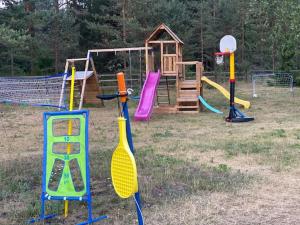 a playground with many different types of playground equipment at Kuru Guest House in Kuru