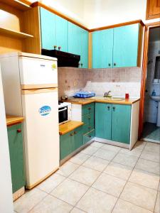 Virtuvė arba virtuvėlė apgyvendinimo įstaigoje Limanaki