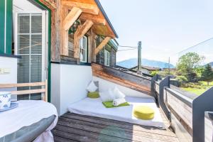 Balkón nebo terasa v ubytování Ferienwohnung Maisonette Höttl