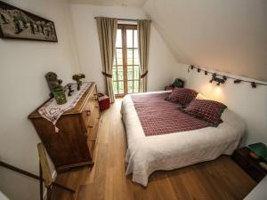 Кровать или кровати в номере B&B 't Hof van Spiere