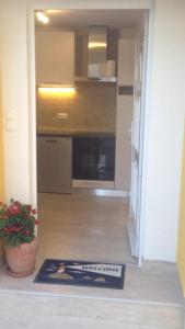 a view of a kitchen with a rug on the floor at Villa Ines in Jezera