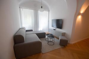 TV a/nebo společenská místnost v ubytování Sobe Merlon