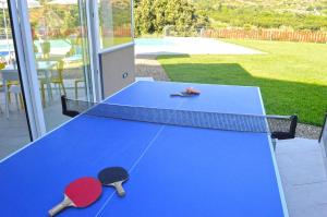 Stolní tenis v ubytování Mauro Home Bed and Relax nebo okolí