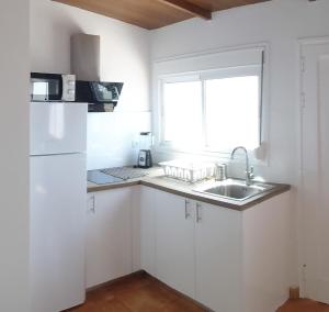 Kuchyň nebo kuchyňský kout v ubytování Loft Con Encanto