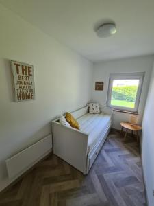 Posteľ alebo postele v izbe v ubytovaní Világos Kert Balatonvilágos Chill House