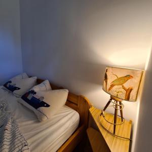Posteľ alebo postele v izbe v ubytovaní Világos Kert Balatonvilágos Chill House