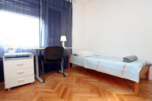 Postel nebo postele na pokoji v ubytování Apartment CVETKO