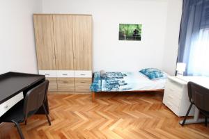 Postel nebo postele na pokoji v ubytování Apartment CVETKO