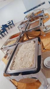 a tray of food sitting on a table at PARK VEREDAS FLAT 322 in Rio Quente +25 photos