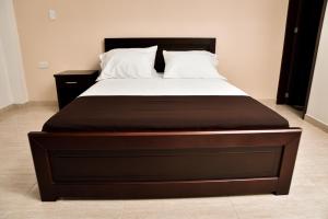 Posteľ alebo postele v izbe v ubytovaní Hotel Patio Bonito