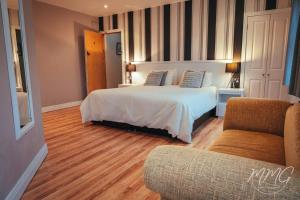 Postel nebo postele na pokoji v ubytování Aaranmore Lodge Guest House
